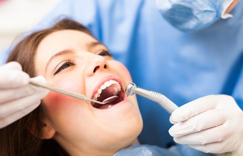 How to Relieve Pain After Teeth Cleaning? Tips and FAQs